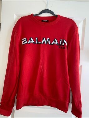 Balmain Red Crewneck Sweatshirt with Contrasting White-Outlined Logo